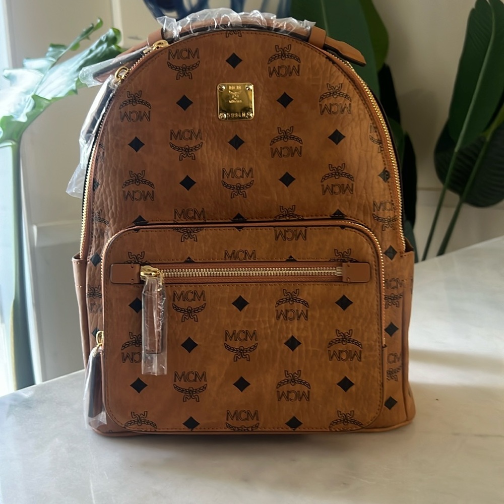 Brand new small  Classic MCM bookbag authentic.